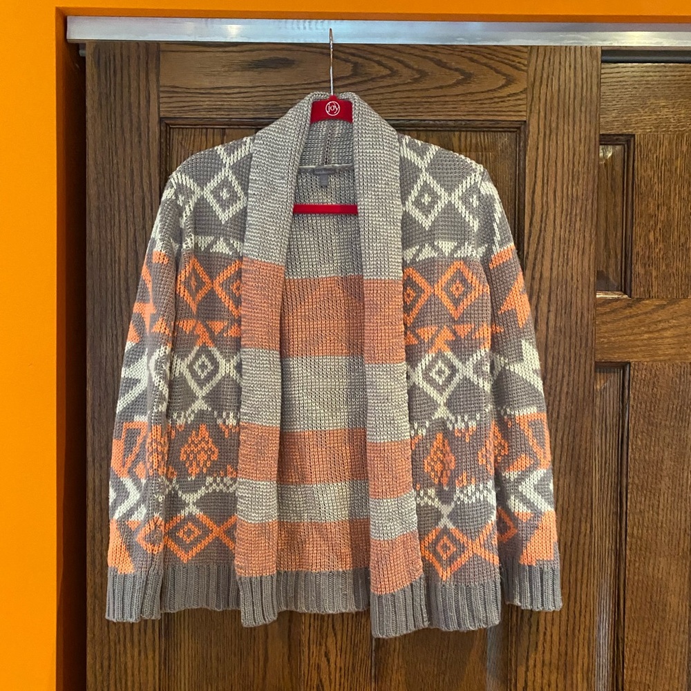 Charlotte Russe pink, gray, and white cardigan.